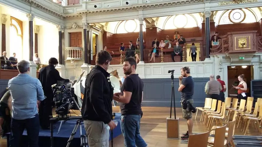 Cameras and staff in the Sheldonian set up for filming.