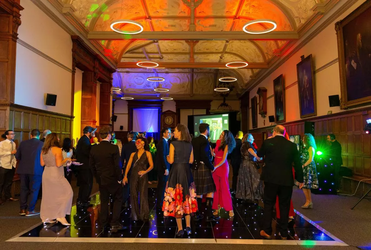 Guests dancing at a Christmas Party in the Examination Schools