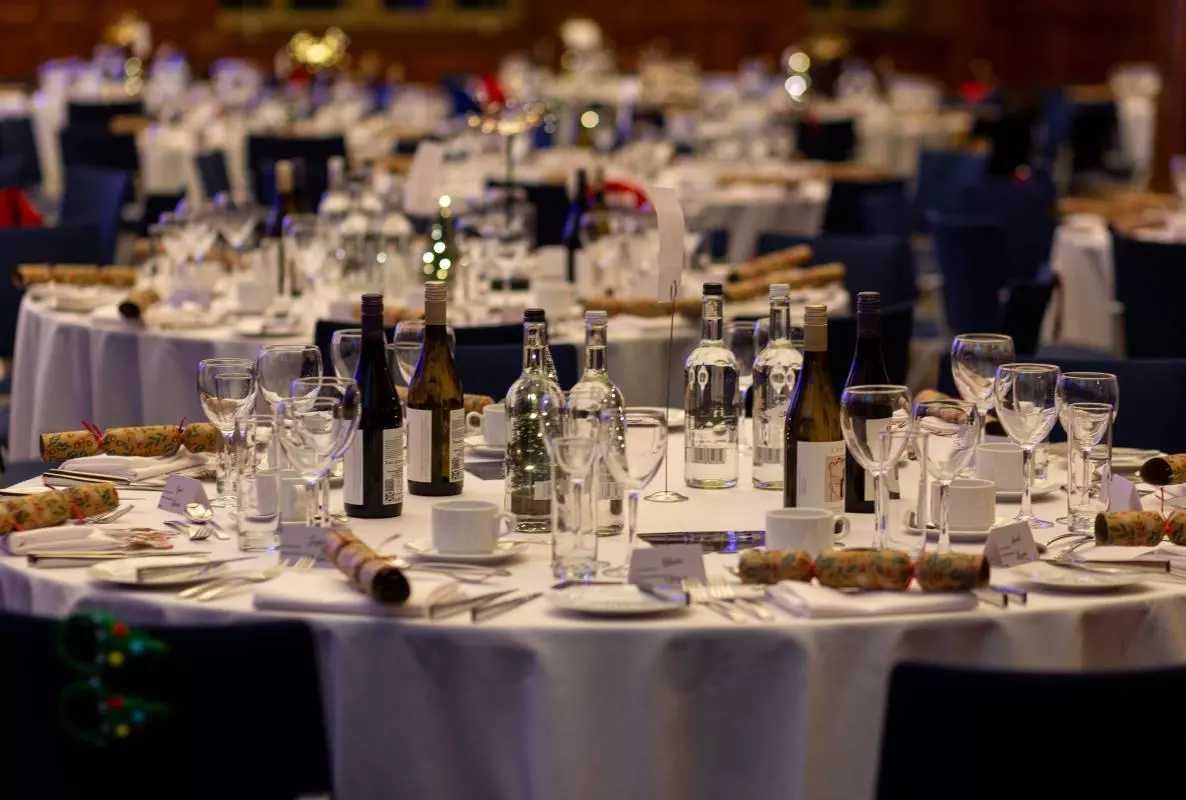 A dinner table set for Christmas