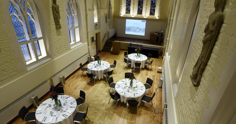 A picture of St Luke's chapel laid out for a dinner